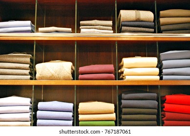 Rows of folded sweaters