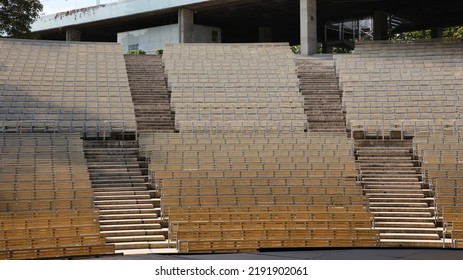 Rows Of Folding Chairs In An Outdoor Theater. Bandstand.