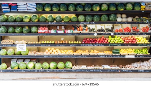 Rows Of Fresh Fruits And Vegetables At A Corner Market Store In New York City