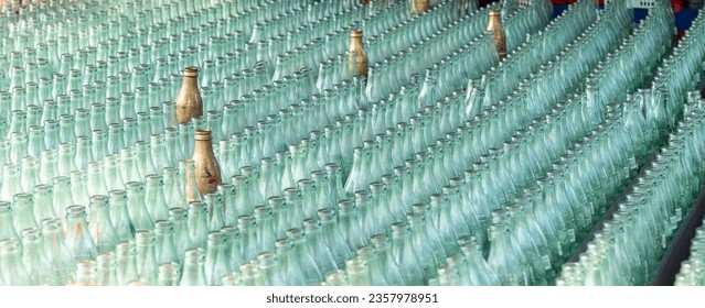 rows of glass bottles for tossing game