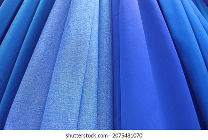 Rows of gradient blue color fabrics for abstract backdrop - Shutterstock ID 2075481070