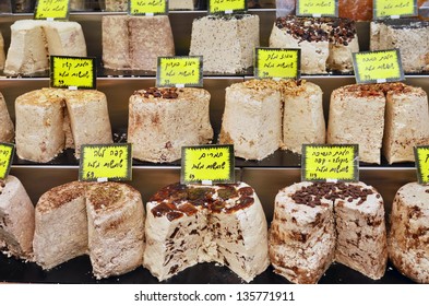 rows of halvah on market stand in Israel