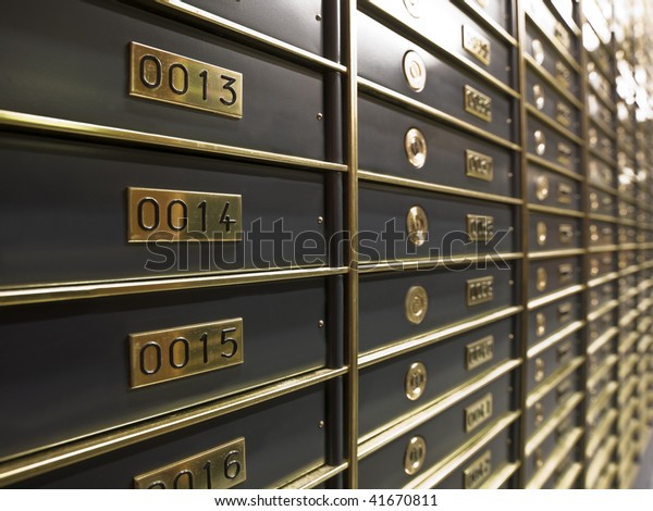Rows of\
luxurious safe deposit boxes in a bank\
vault