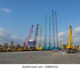 rows of many type of crane, crawler,mobile, truck, all terrian crane - Shutterstock ID 558845152