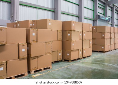 Rows of material boxes or product boxes in warehouse area. - Shutterstock ID 1347888509