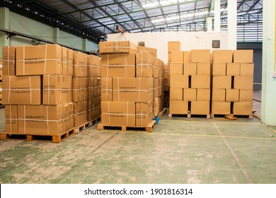 The rows of material boxes or product boxes in warehouse area.