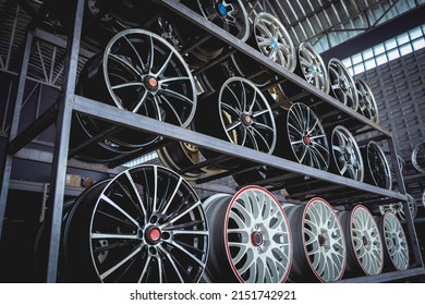Rows of metal car disks in a shop - Shutterstock ID 2151742921