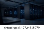 Rows of modern server racks displaying active blue and green indicator lights, showcasing the advanced technology of a data center