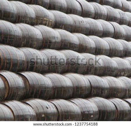 Rows of oak casks for whisky - Speyside cooperage, Scotland