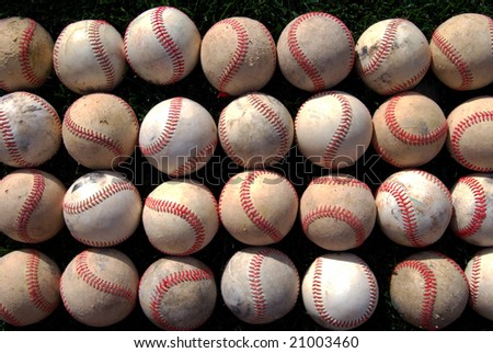 Rows of old baseballs