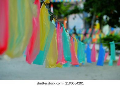 Rows Of Plastic Ornaments Hang Over The Street. Independence Day Celebrations In Indonesia