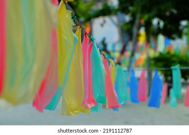 Rows Of Plastic Ornaments Hang Over The Street. Independence Day Celebrations In Indonesia