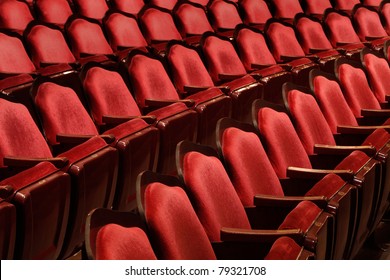 Rows Of Red Velvet Theater Seats In An Old Vaudeville Style Theater.