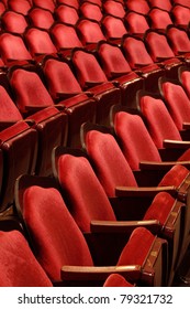 Rows Of Red Velvet Theater Seats In An Old Vaudeville Style Theater.