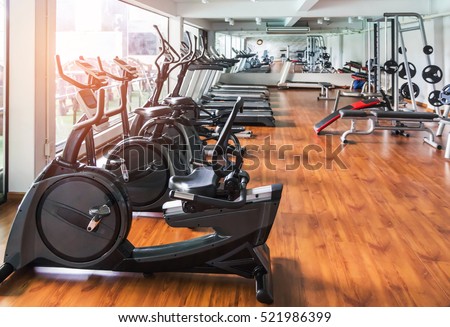 rows of stationary bike in gym modern fitness center room