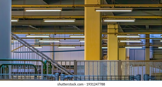 Rows and rows of TL lights keep the post office transit bay, at the back of the central station, in Kagoshima city, Japan, awash in adequate and ample lightening.