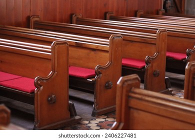 Rows of traditional wooden church pews  - Powered by Shutterstock