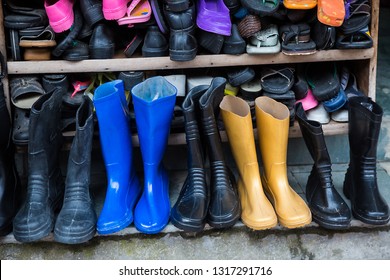 Rows of various winter boots, shoes and slipper, shop - Image - Powered by Shutterstock