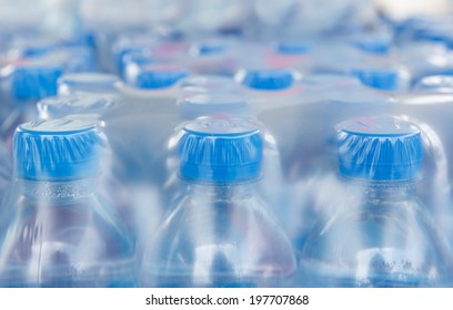 Rows Of Water Bottles In Plastic Wrap