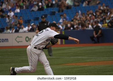 Roy Halladay Delivers A Pitch At Rogers Centre