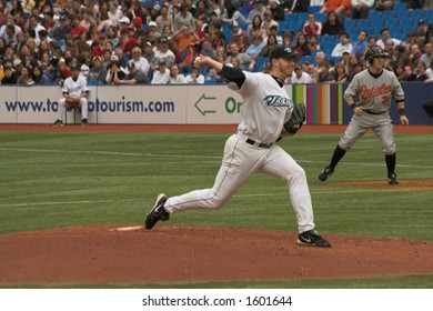 Roy Halladay Pitches, While There Is A Man On 1st Base