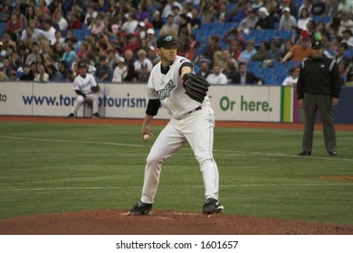 Roy Halladay Prepares His Pitch As He Steps Off The Mound