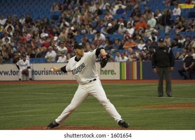 Roy Halladay, Toronto's Ace Pitcher, Delivering A Pitch