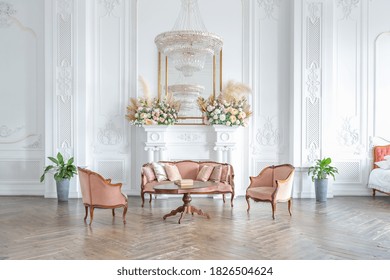 Royal Baroque Style Luxury Posh Interior Of Large Room. Extra White, Full Of Day Light. High Ceiling And Walls Decorated By Stucco