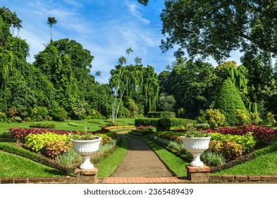 Royal Botanic Gardens, Peradeniya are about 5.5 km to the west of the city of Kandy in the Central Province of Sri Lanka. It attracts 2 million visitors annually. It is near the Mahaweli River. - Shutterstock ID 2365489439