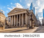 Royal Exchange building in City of London, UK (translation "founded in thirteenth year of Queen Elizabeth, and restored in eighth of Queen Victoria")