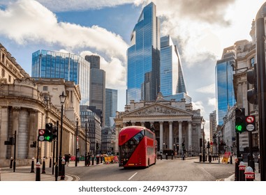 Royal Exchange building and skyscrapers in City of London, UK