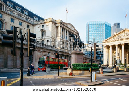 Royal Exchange Stock Market Building and Bank of England architecture in financial street in London city in UK. Cityscape with square and Duke Wellington in square. View on Old town, United Kingdom