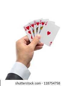 A royal flush in hearts in hand isolated on white background