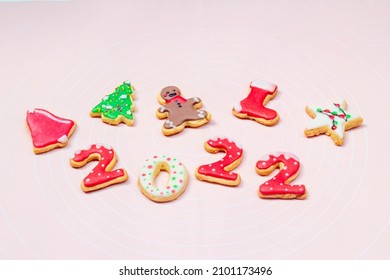 Royal Icing Christmas Cookies On White Plate