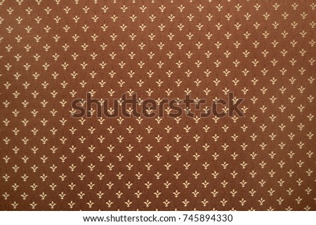 Royal lily or fleur-de-lis pattern on cloth