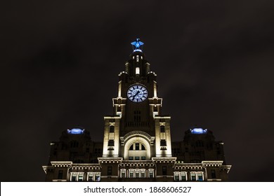 The Royal Liver Building In Liverpool Lit Up At Night In December 2020.