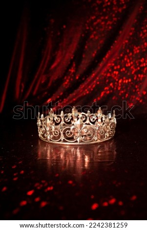Royal luxury crown on red background. Princess and queen.