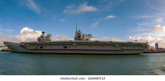 The Royal Navy Aircraft Carrier HMS Queen Elizabeth (RO8) Docked In Portsmouth, UK