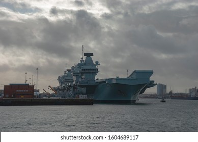 The Royal Navy Aircraft Carrier HMS Queen Elizabeth (RO8) Docked In Portsmouth, UK