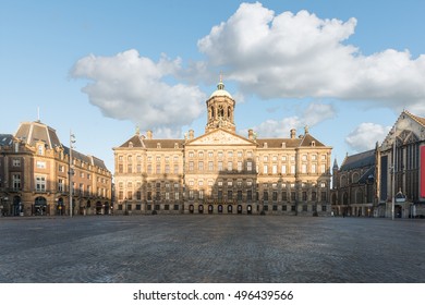 Royal Palace at the Dam Square in Amsterdam, Netherlands. No people in Dam Square in Amsterdam, Netherlands. Landscape and nature travel, or historical building and sightseeing concept