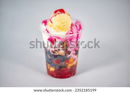 Royal rainbow colour faluda, favourite Indian dessert served with various flavour ice cream and dry fruits , nuts and fresh fruits. Royal Special Faluda.
