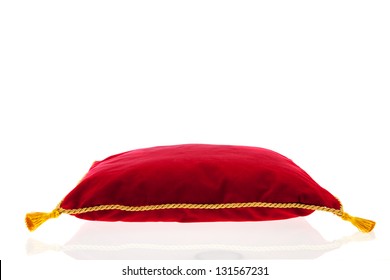 Royal Red Velvet Pillow With Golden Rope Isolated Over White Background