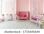 royal sitting room luxury interior of large flat in pink colors with expensive furniture in rich barocco style decorated with flowers in vases.  royal sitting room
