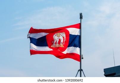 The Royal Thai Navy Flag Isolated On Blue Sky Background.