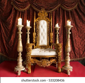 Royal Throne Of Gold On Red Curtain Background