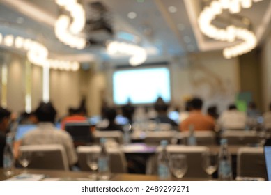 Royalty high quality free stock photo of abstract blur and defocused unidentified peoples are attending a AI artificial intelligence, no-sql database technology event