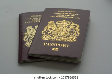 Royston UK - 4 March 2018: Two UK passports, isolated on white (Illustrative editorial)