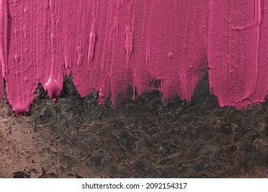 Rozmazana, różowa farba na abstrakcyjnym, surowym tle.              Smudged pink paint on an abstract, raw background. - Shutterstock ID 2092154317