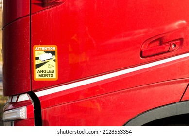 Roznov Czech rep Feb 18th, 2022 attention angles morts truck sticker blind spots obligatory on a red truck door.