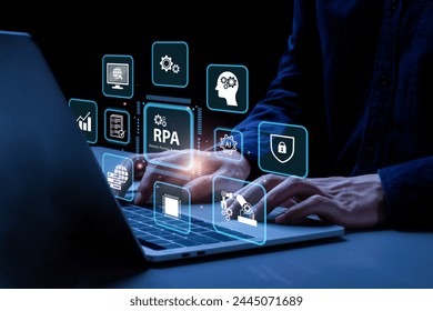 RPA Robotic process automation innovation technology concept. Businessman working on laptop using digital RPA interface.  Intelligent system automation. AI. Artificial intelligence.  - Powered by Shutterstock